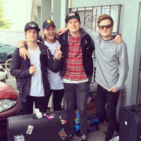 A band arriving at Panda with their suitcases, 2014