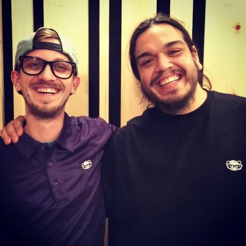 Sam Pura and a friend laughing, 2014