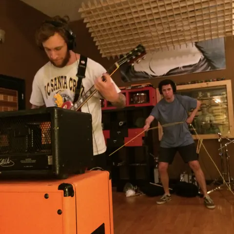 The Story So Far tracking guitar while a friend dances behind him, February 2015