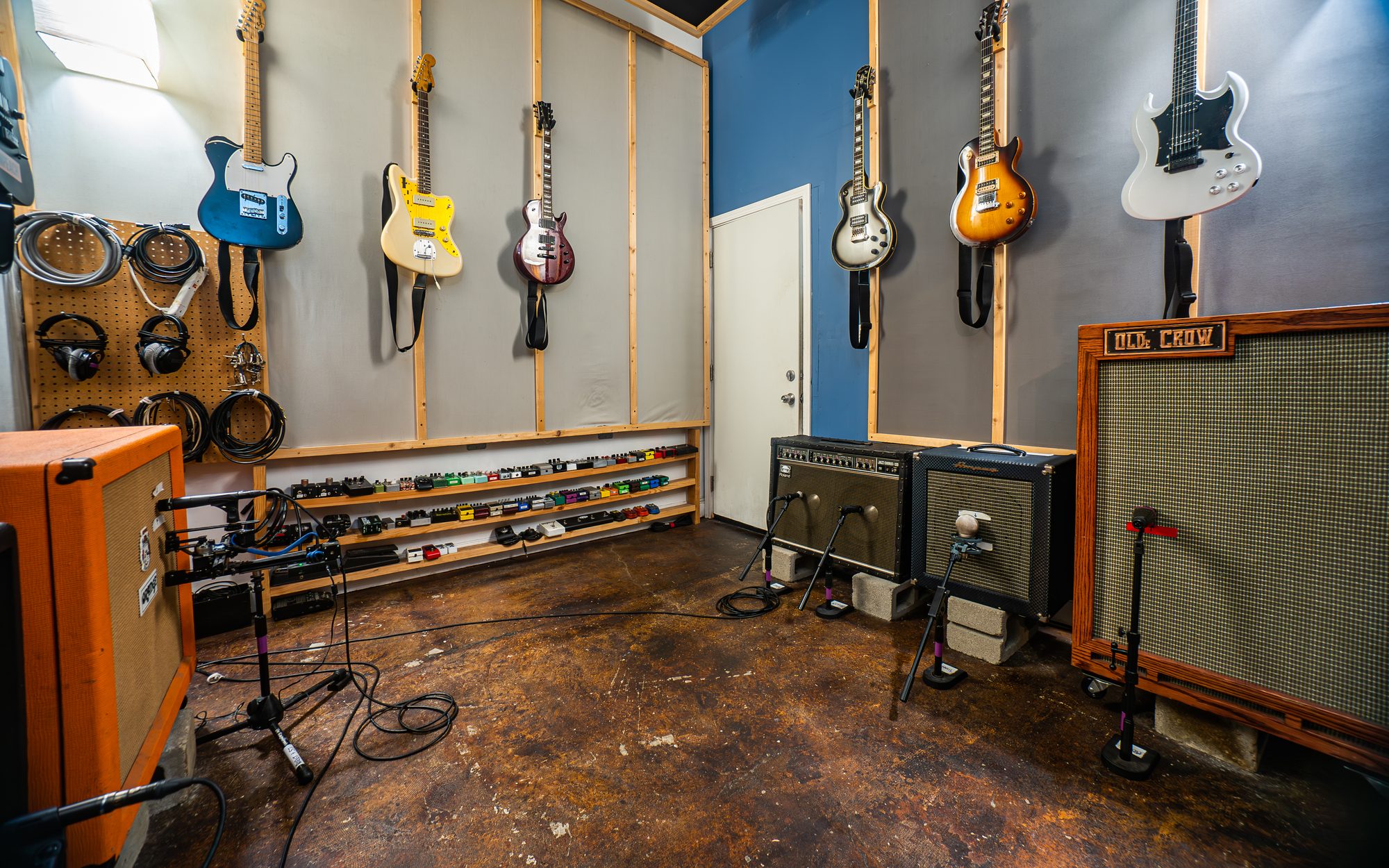 Isolation room with the amp and cabinet collection at The Panda Studios