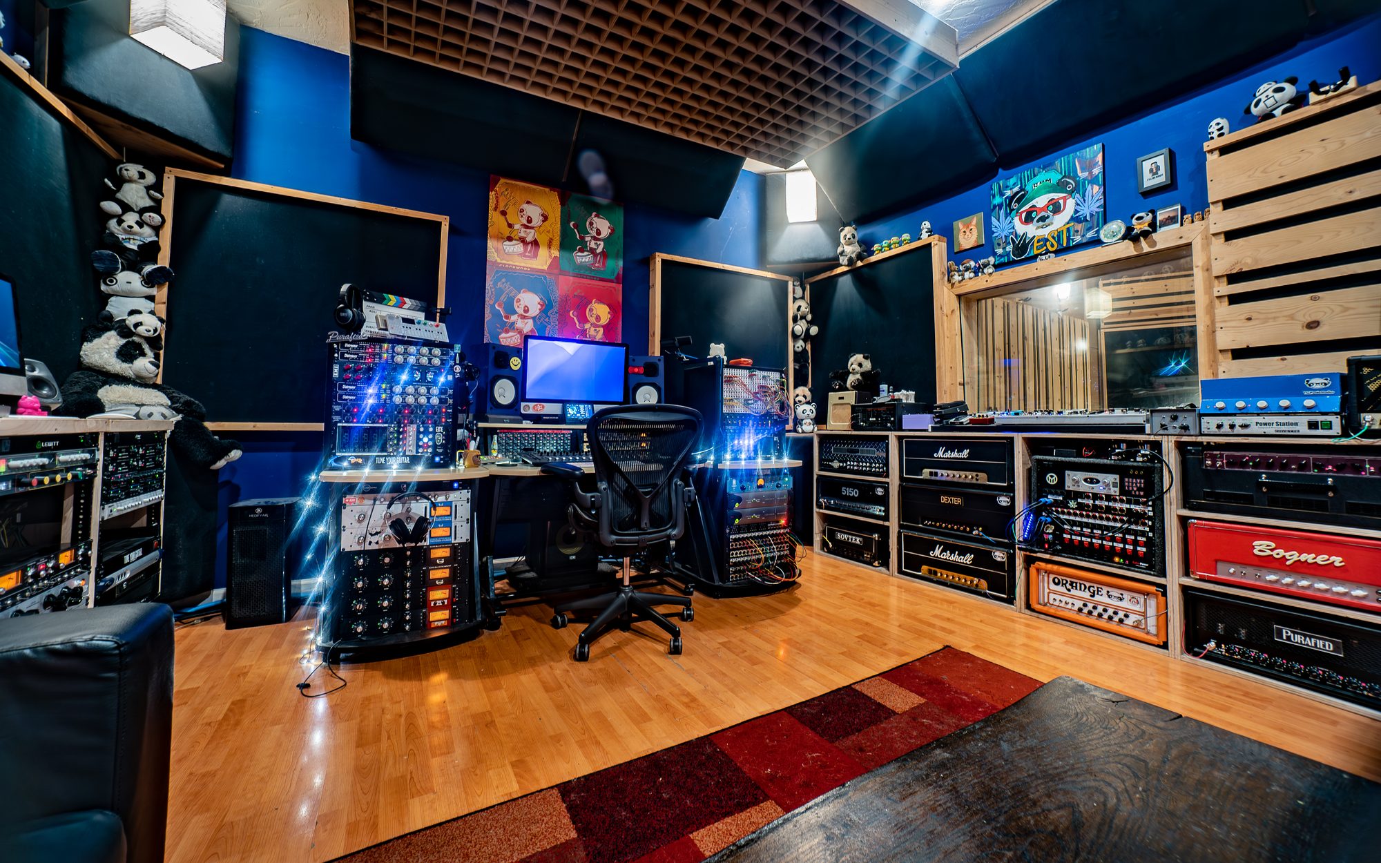 Panda West control room with guitars and monitoring