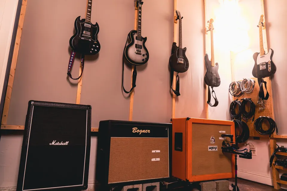 Isolation room with guitars and cabinets